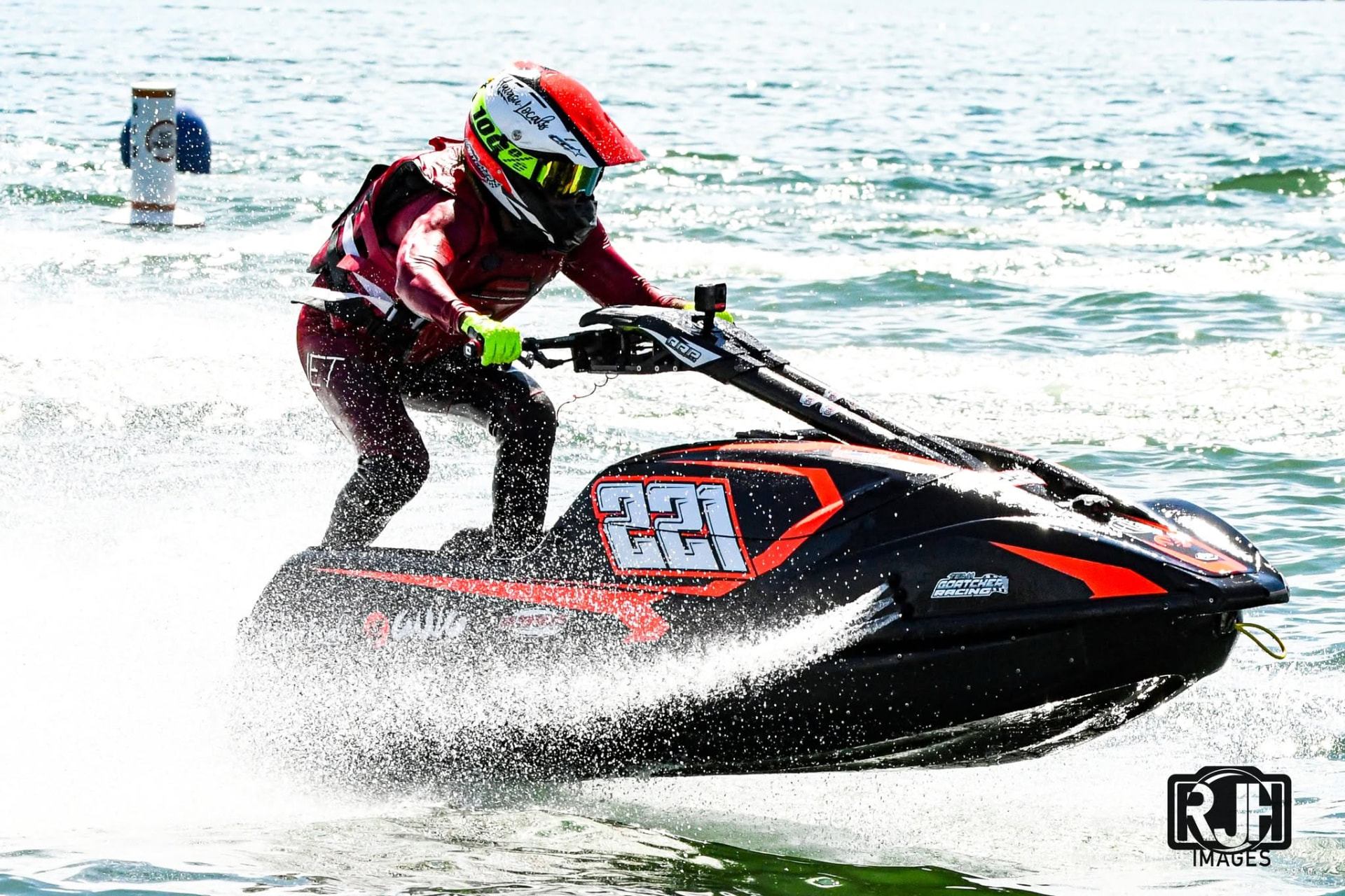 Team Goatcher Racing number 221 jet ski racing at full speed